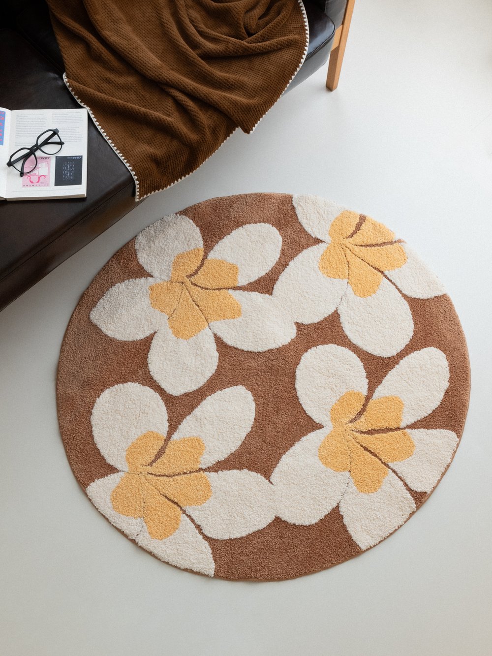Plumi Plumeria Round Rug - styled view