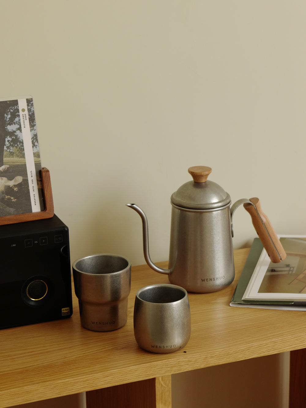 WENSHUO stainless steel coffee vessels on a wooden shelf