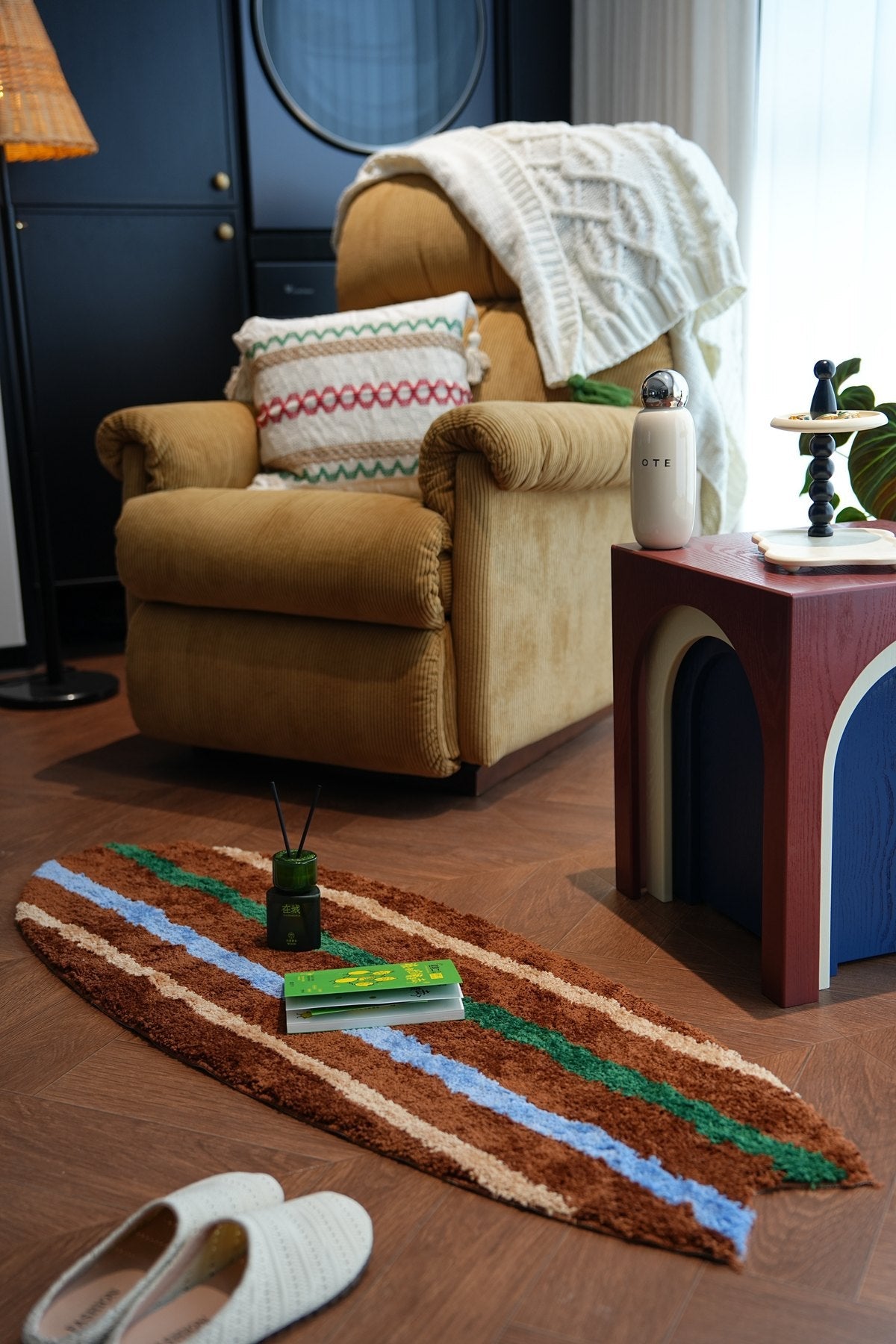 Area Rug beside a Quiet Daily Object