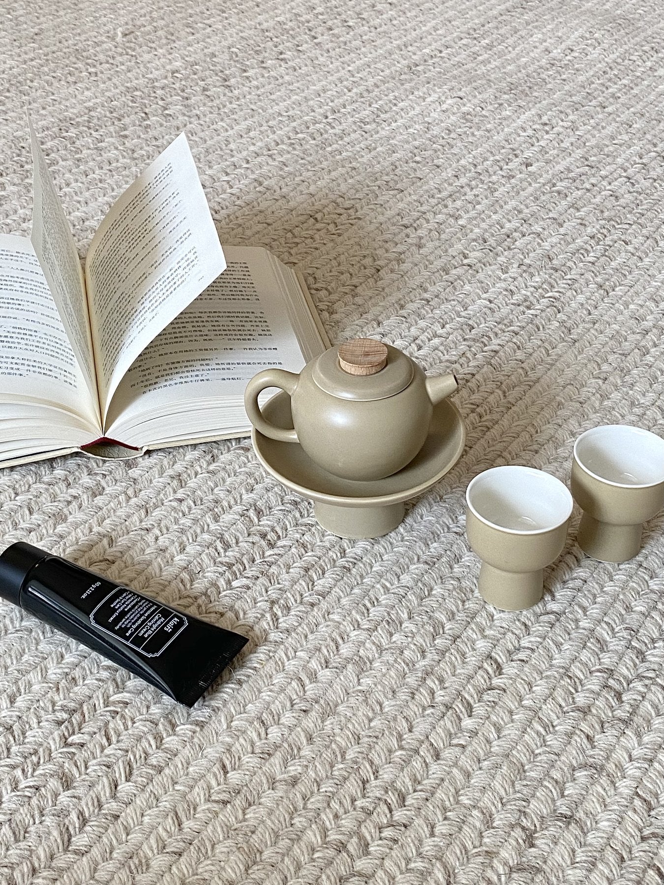 Light Tea Set beside a Quiet Daily Object