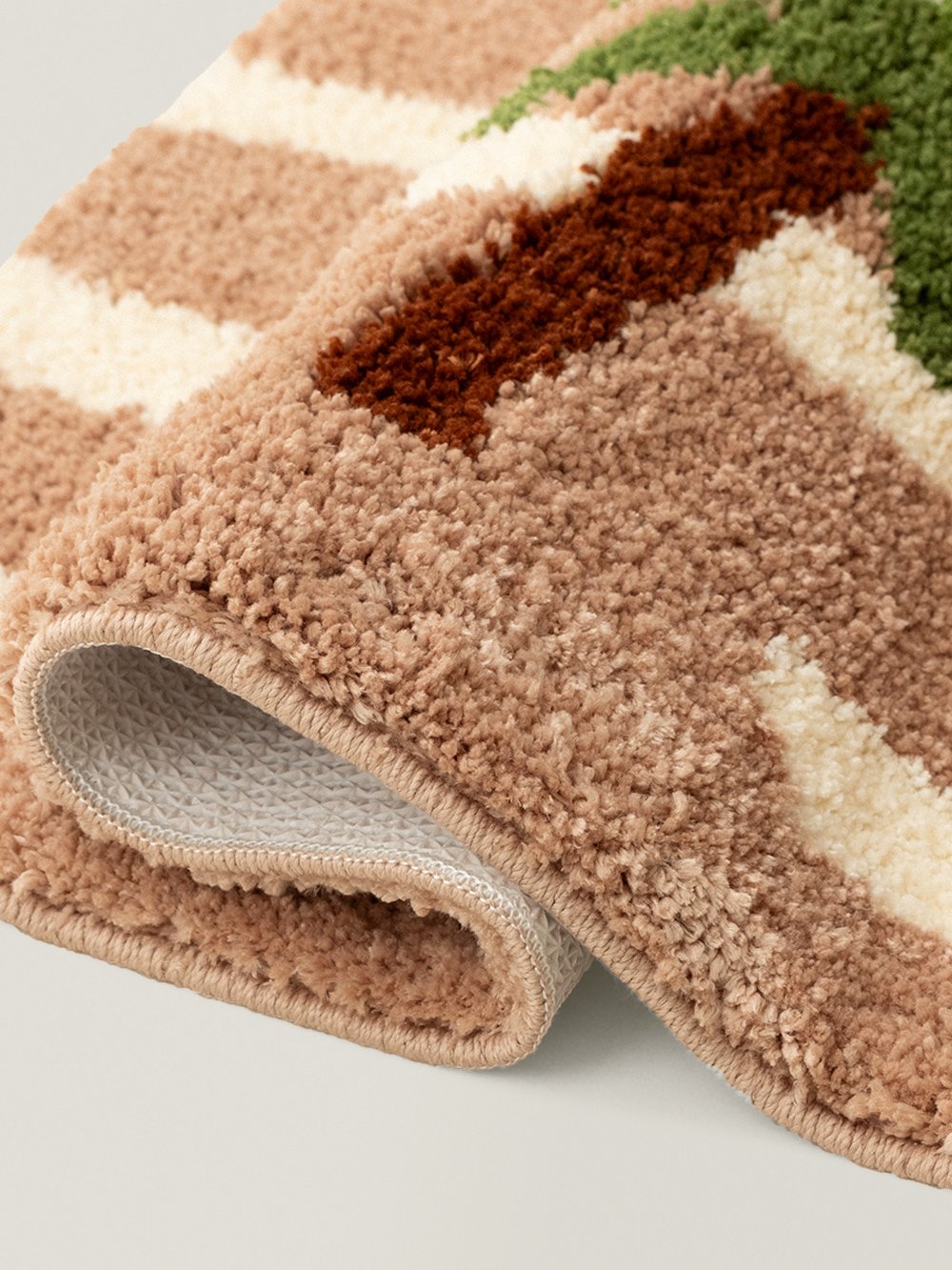Palma Palm Stripe Rug - edge and backing detail