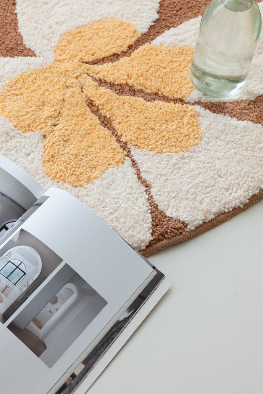 Plumi Plumeria Round Rug - styled view